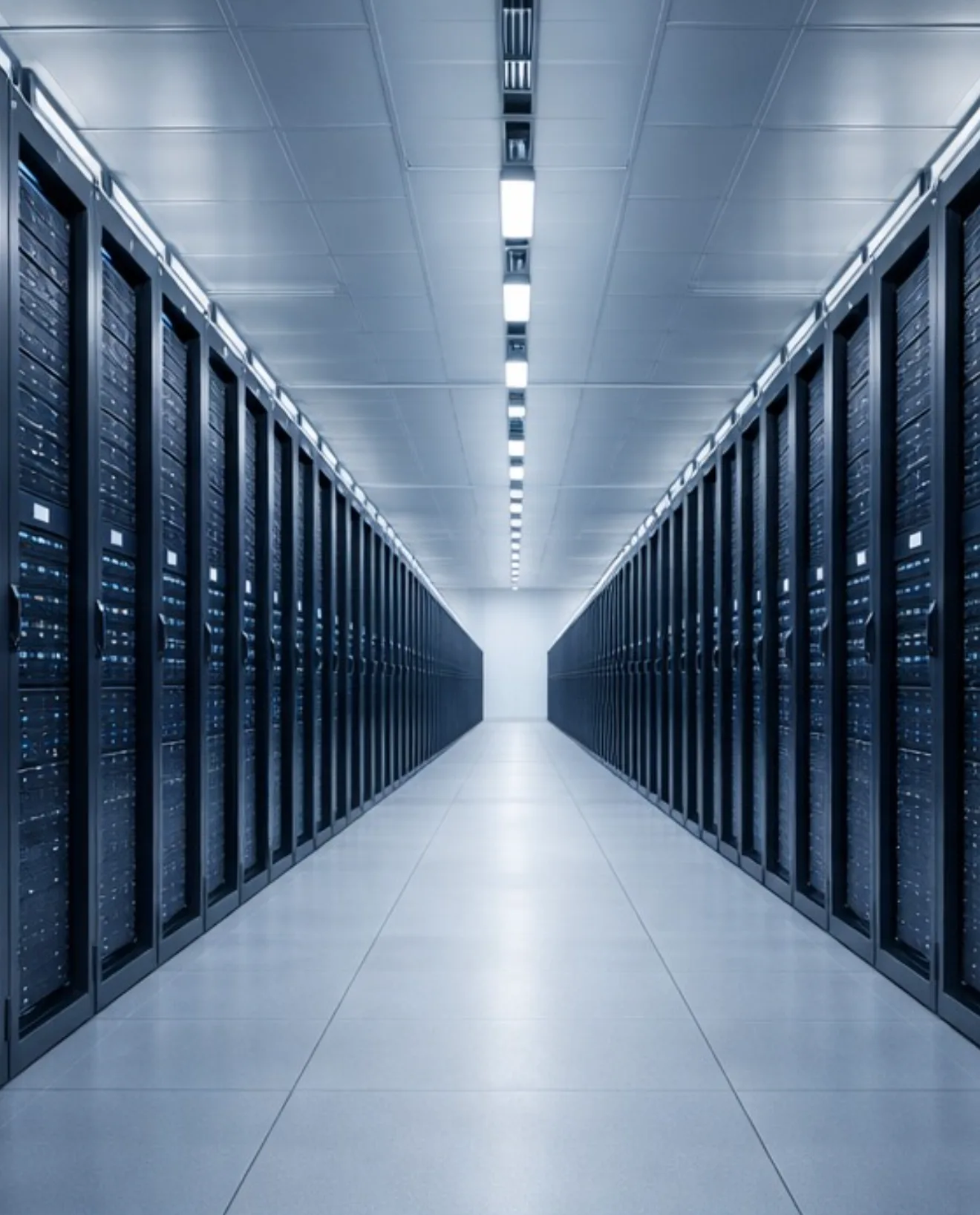 A data-centre aisle lined with rows of server racks.